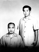 Yek (standing) with Huang
