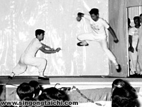 Yek (left) at a public demonstration for Huang's Tai Chi